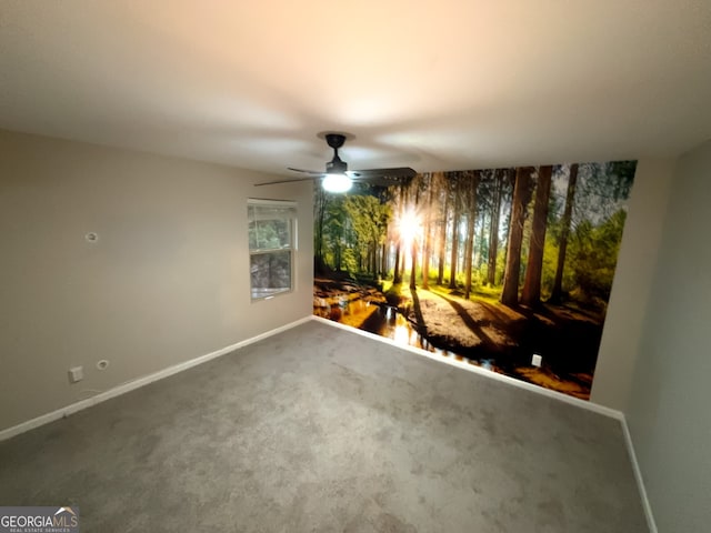 unfurnished room featuring carpet flooring