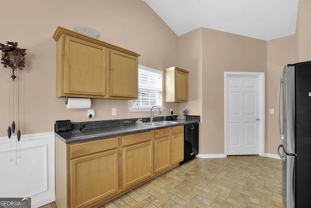 kitchen featuring stainless steel fridge, black dishwasher, sink, and light brown cabinets