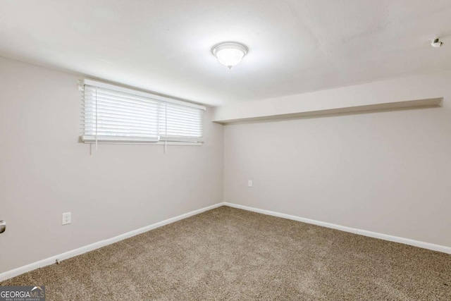 basement featuring carpet flooring