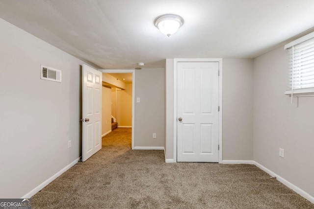 unfurnished bedroom featuring carpet floors