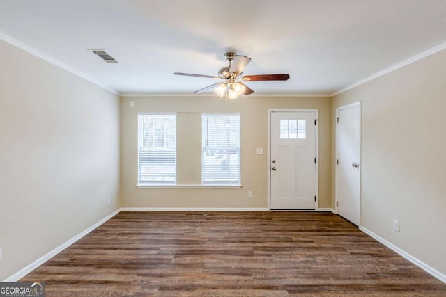 entryway featuring crown molding, ceiling fan, and dark hardwood / wood-style flooring