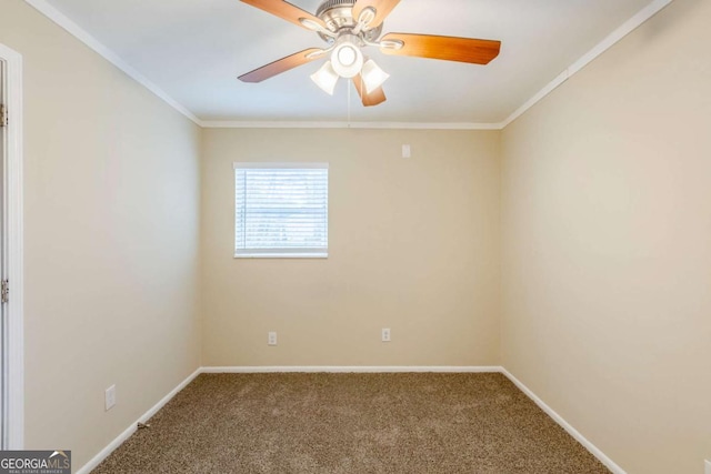 spare room with crown molding, carpet, and ceiling fan