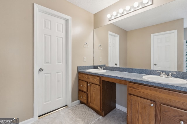 bathroom featuring vanity and tile patterned floors