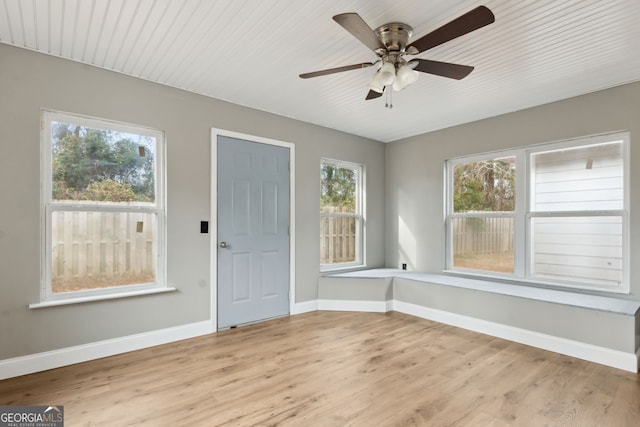 interior space with plenty of natural light and ceiling fan