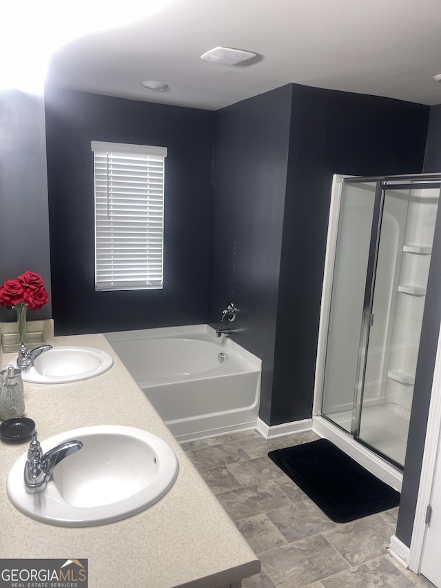 bathroom with plus walk in shower and vanity