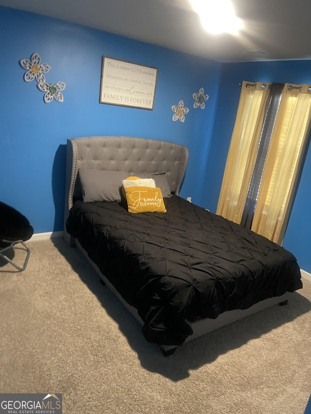 bedroom featuring carpet floors