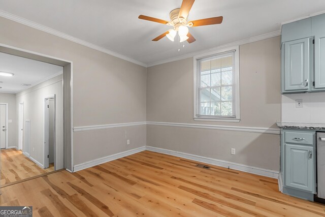 unfurnished dining area with crown molding, ceiling fan, and light hardwood / wood-style flooring