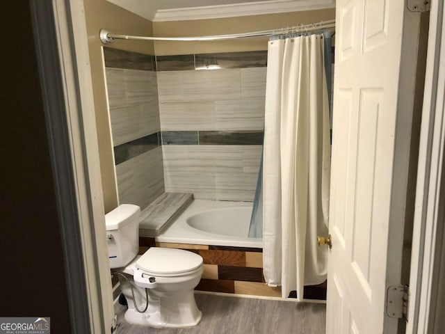 bathroom with ornamental molding, toilet, shower / tub combo, and wood-type flooring