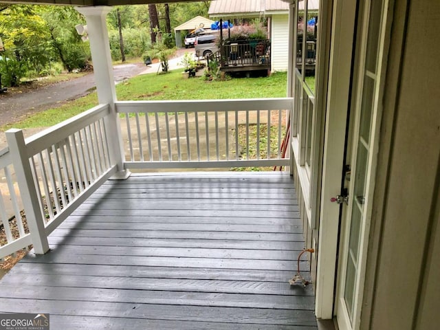 deck featuring covered porch