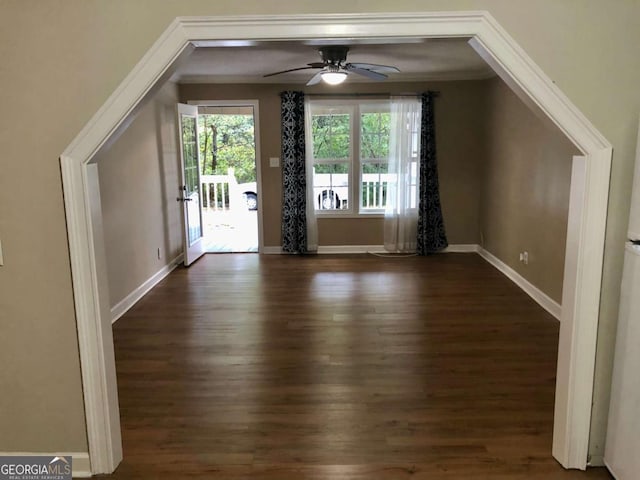 bonus room featuring ceiling fan and dark hardwood / wood-style floors