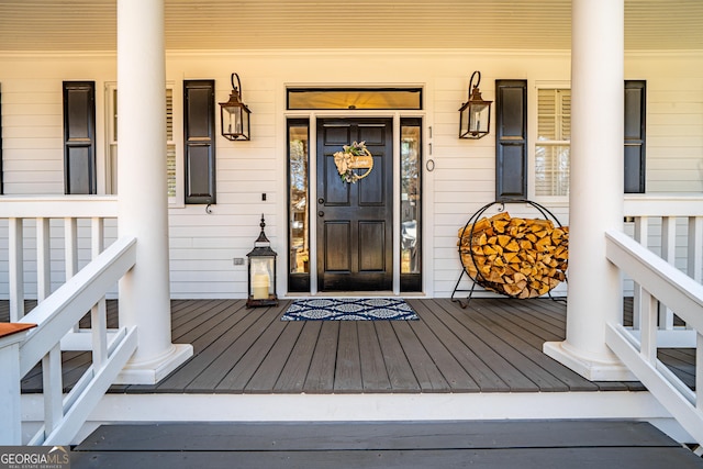 doorway to property with covered porch