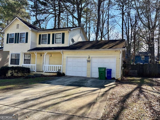 view of front of home featuring a garage and covered porch