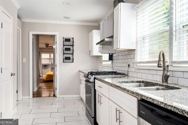 1574 Mayflower St, Atlanta, GA 30311 - kitchen featuring light stone countertops, stainless steel gas stove, a sink, and dishwasher