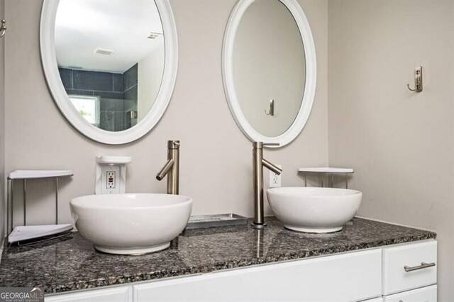 1574 Mayflower St, Atlanta, GA 30311 - full bathroom featuring a sink and double vanity