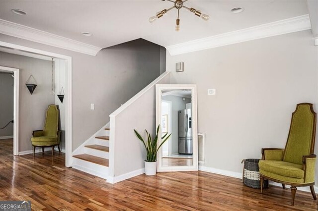 1574 Mayflower St, Atlanta, GA 30311 - living area with wood finished floors, stairs, and ornamental molding