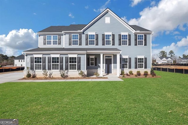 view of front facade featuring a front lawn