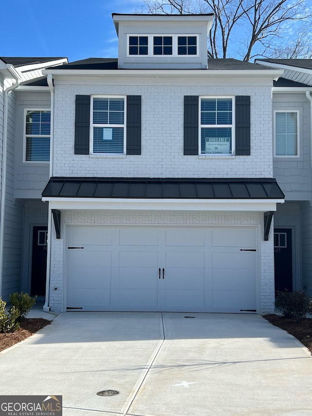 view of property featuring a garage