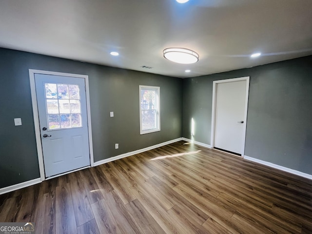 entrance foyer featuring hardwood / wood-style flooring