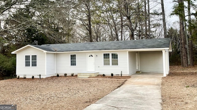 view of front of property with a carport