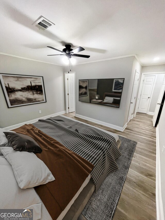 kitchen featuring sink, light hardwood / wood-style floors, white cabinets, and appliances with stainless steel finishes