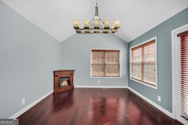 unfurnished living room featuring lofted ceiling