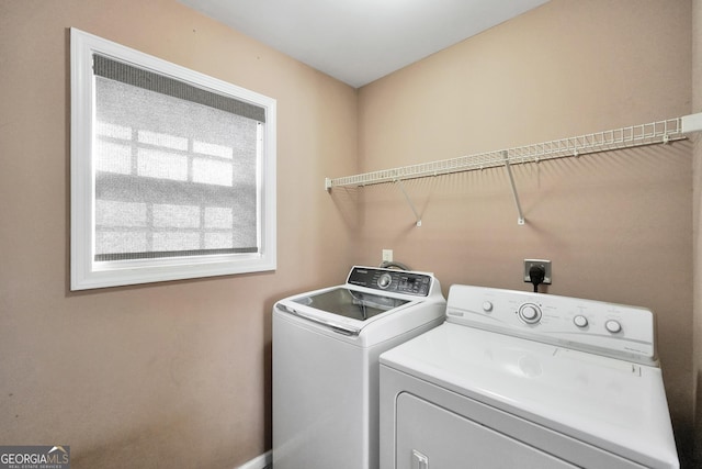 laundry area with washer and clothes dryer