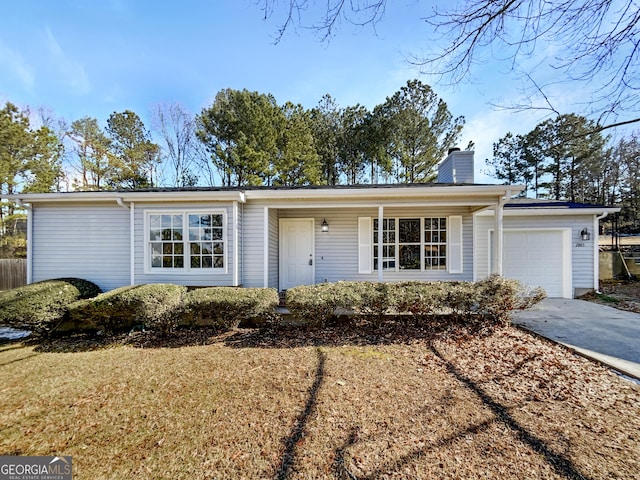 single story home featuring a garage