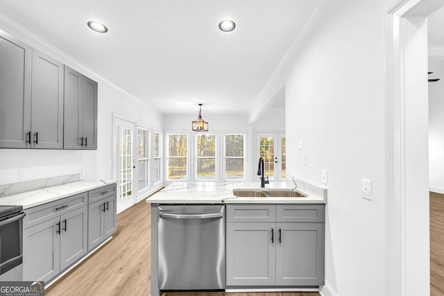 kitchen featuring sink, gray cabinets, stainless steel appliances, light stone counters, and french doors