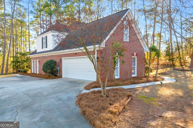 view of home's exterior with a garage