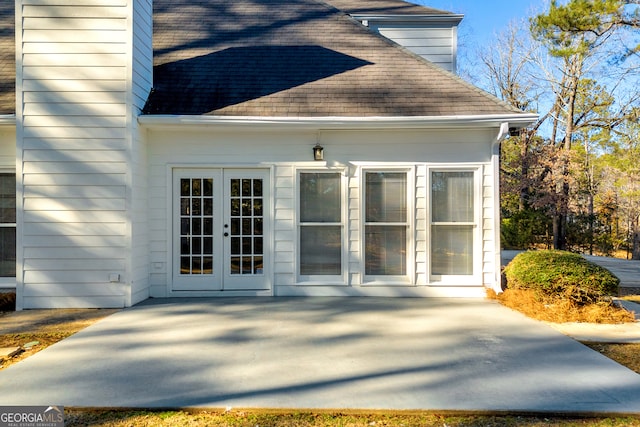 view of side of home with french doors and a patio area