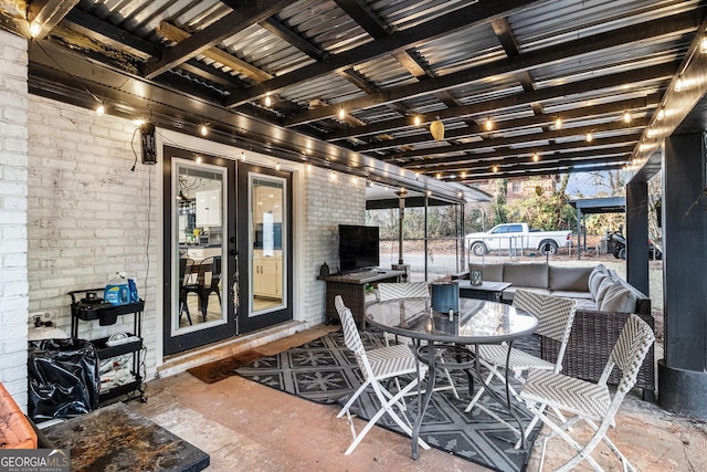 view of patio / terrace featuring french doors