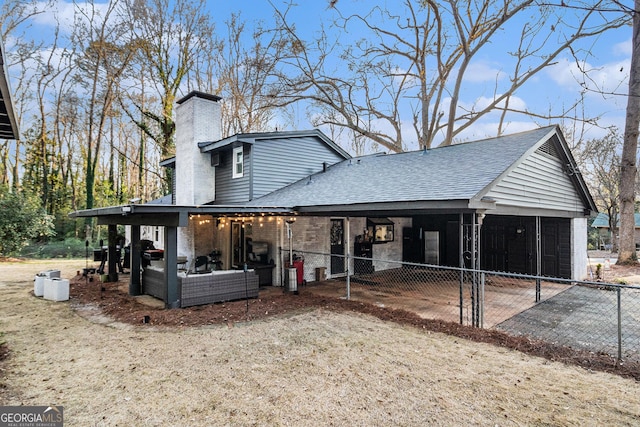 exterior space featuring a patio area and outdoor lounge area