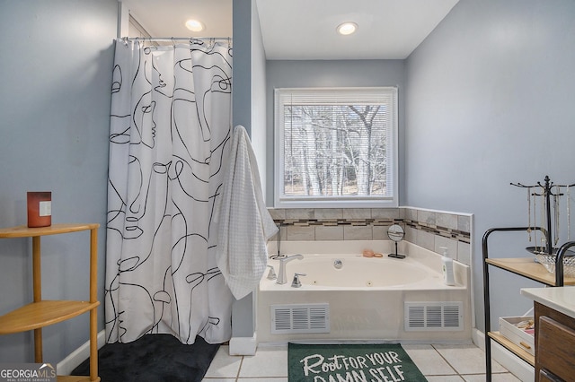 bathroom with tile patterned floors, shower with separate bathtub, and vanity