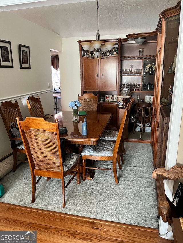 dining area with hardwood / wood-style floors