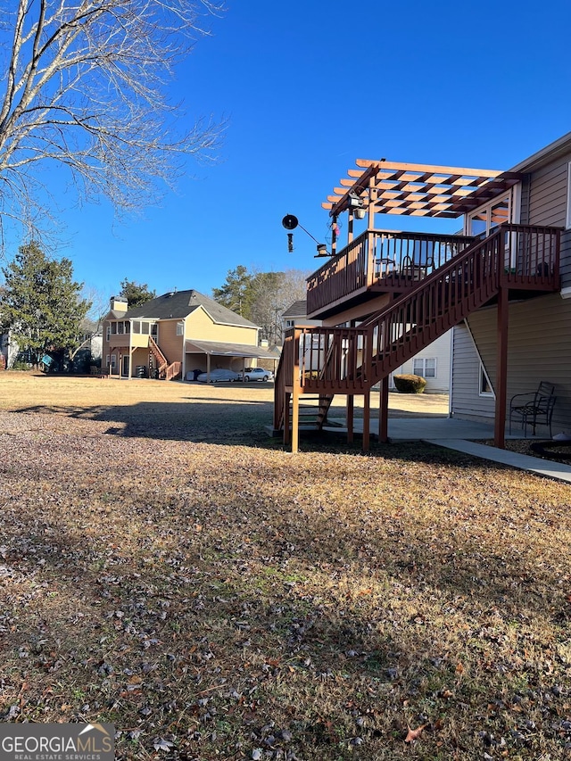 view of yard featuring a wooden deck