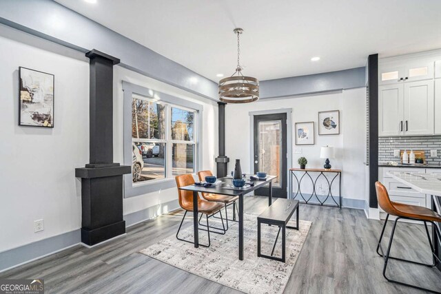 dining area with light hardwood / wood-style floors