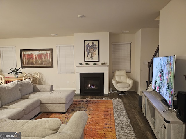 living room featuring dark hardwood / wood-style floors