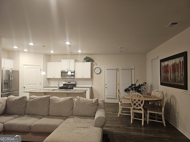 living room with dark wood-type flooring