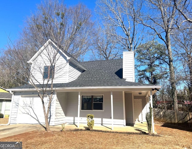 view of front of home with a garage and covered porch