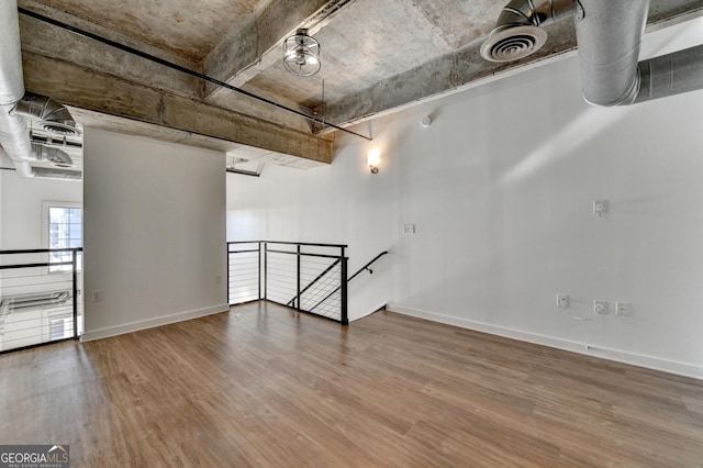 basement with wood-type flooring