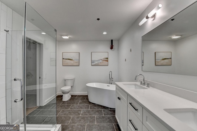 full bathroom with vanity, tile patterned floors, plus walk in shower, and toilet