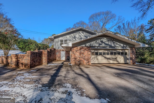 view of side of property featuring a garage