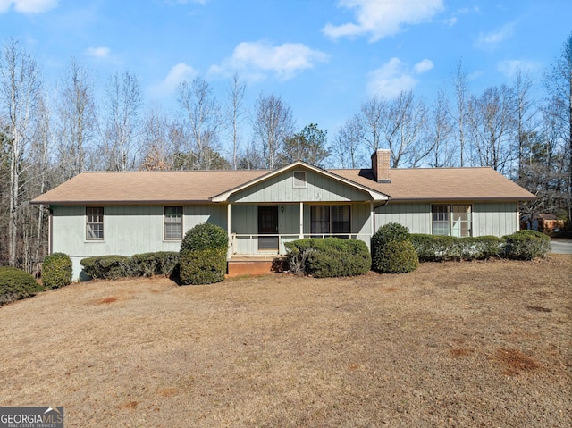 ranch-style home with a front yard