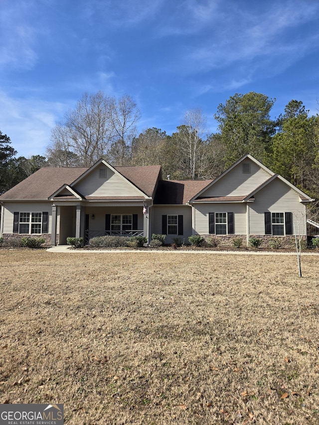 single story home with a front yard