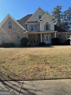 view of front of house with a front lawn