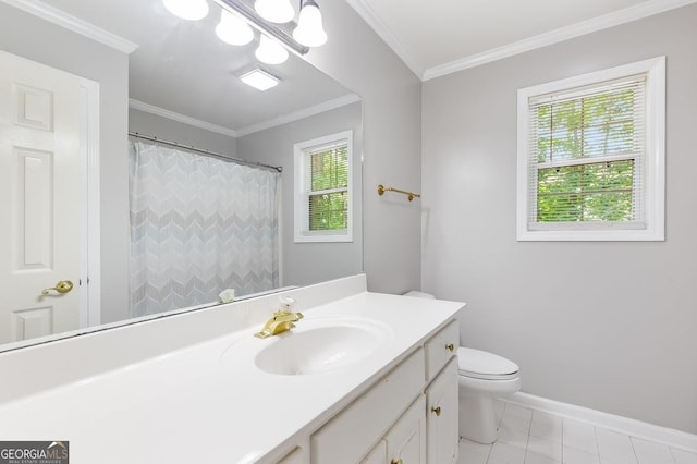 bathroom featuring vanity, tile patterned flooring, crown molding, and plenty of natural light