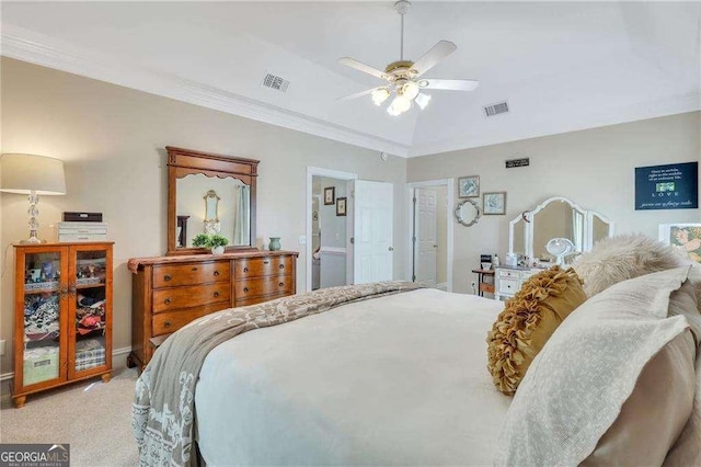 carpeted bedroom featuring crown molding, vaulted ceiling, and ceiling fan