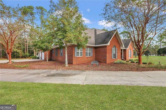 view of property exterior with a yard