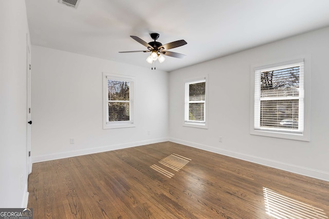 spare room featuring ceiling fan and wood-type flooring