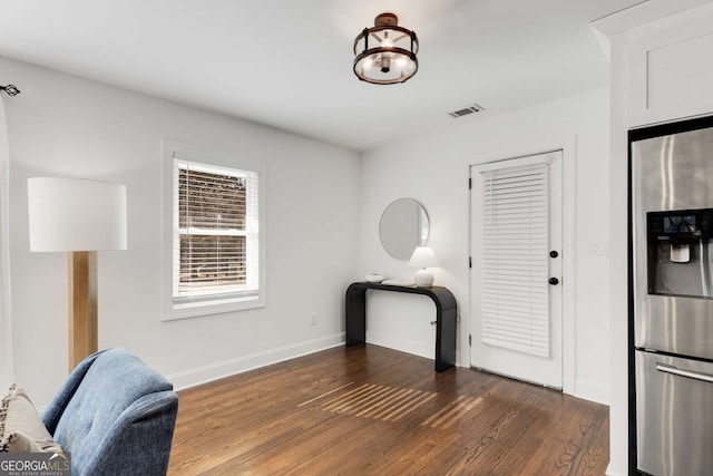 interior space with dark wood-type flooring